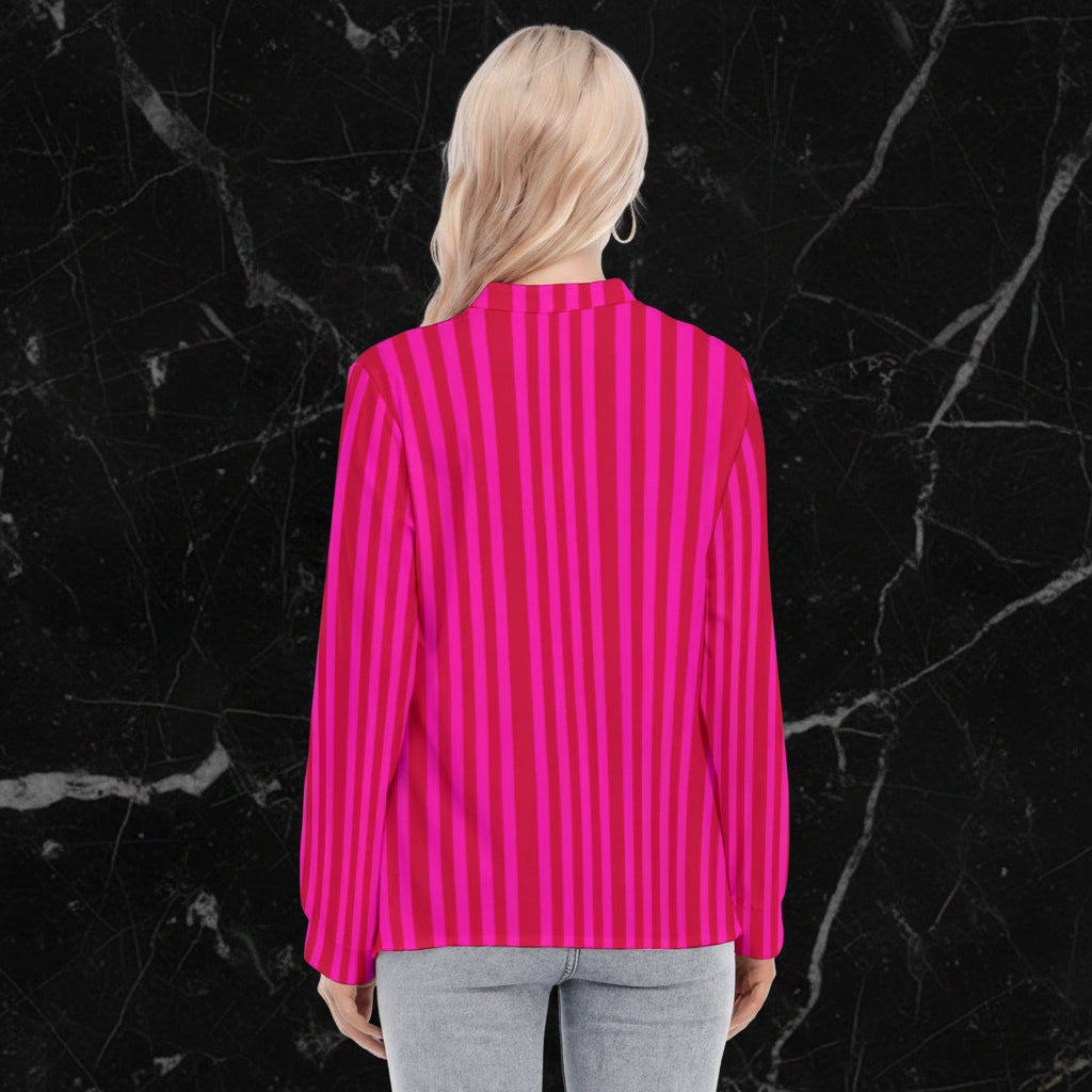 Back view of a woman wearing a pink and red striped shirt