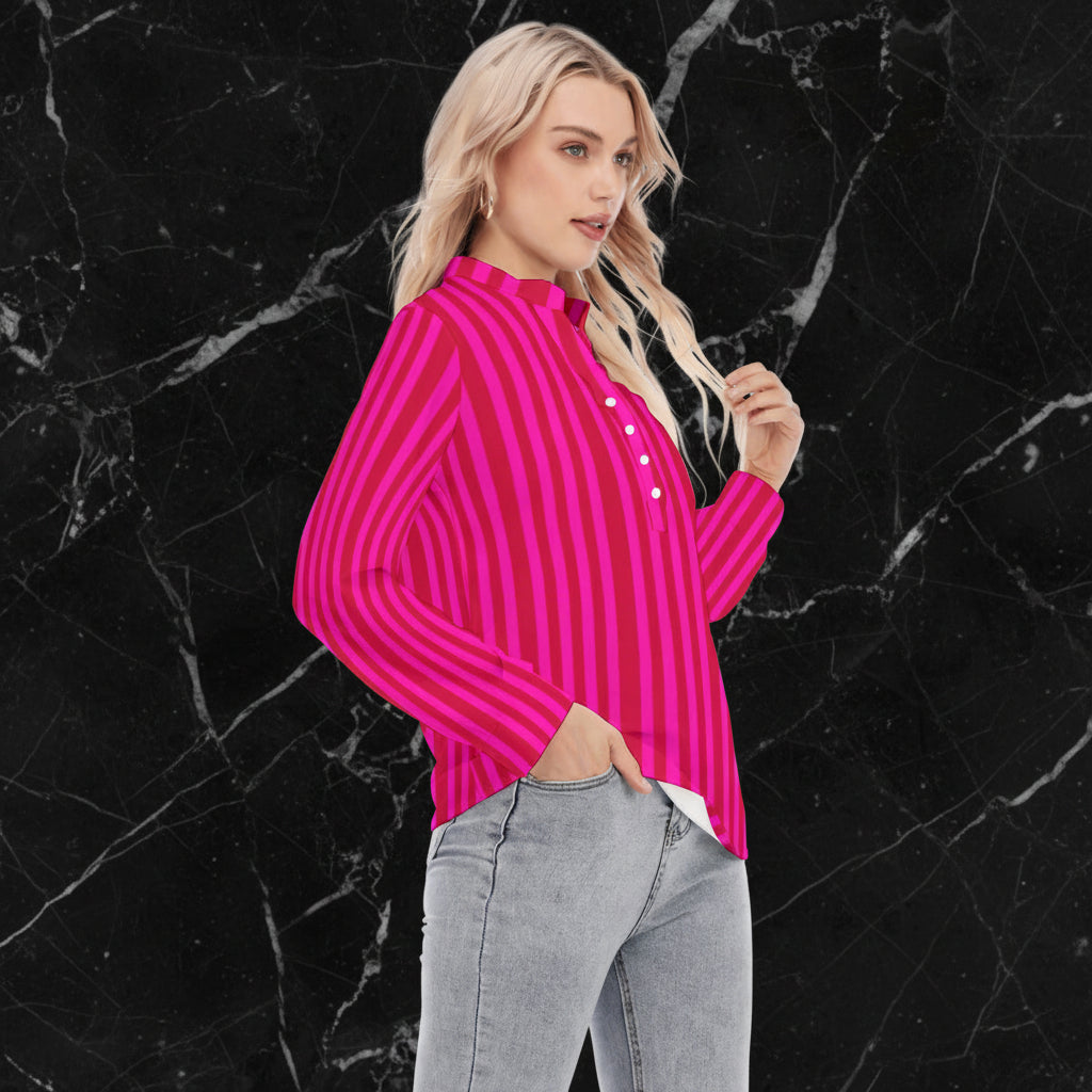 Side view of a woman wearing a pink and red striped shirt